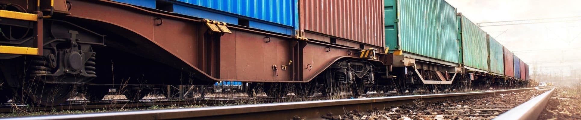The Pros and Cons of Shipping by Rail vs. Road